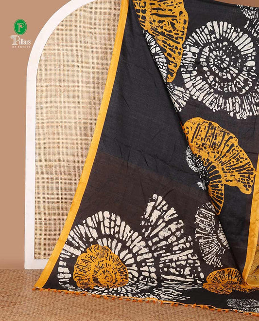 Black batik-style uniquely printed khadi cotton saree, contrast yellow piping border & printed pallu