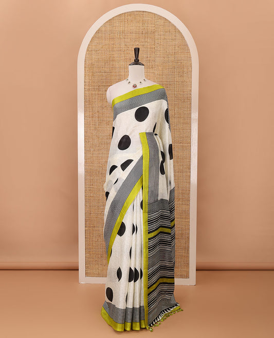 Cream polka dot printed khadi cotton saree, contrast piping border with stripes print, stripes printed pallu & green stripes printed blouse