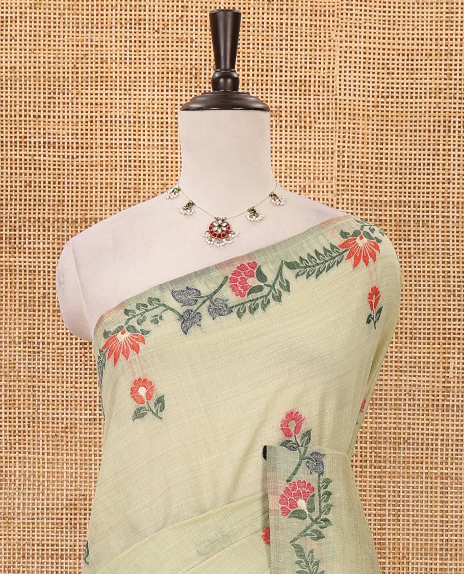 Light green meena buttas woven linen saree, jamdhani-style floral design woven border, floral design pallu & contrast zari butta blouse