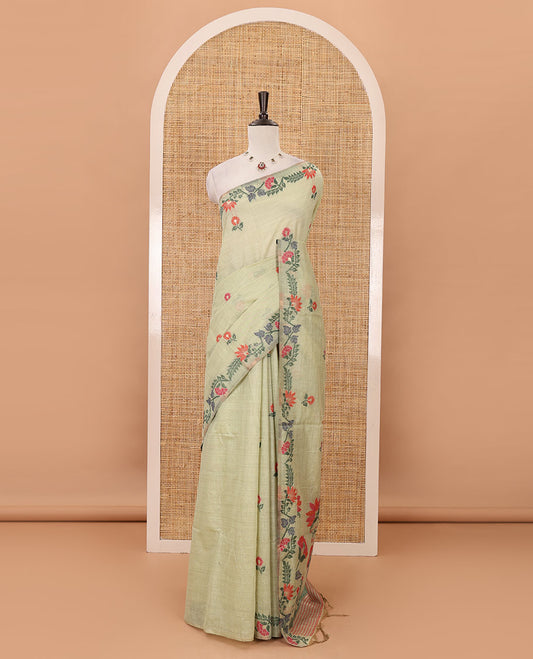 Light green meena buttas woven linen saree, jamdhani-style floral design woven border, floral design pallu & contrast zari butta blouse