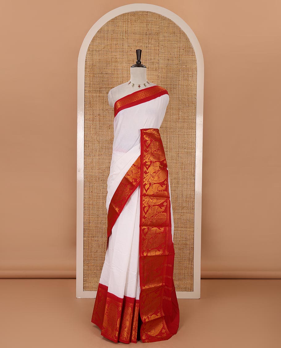 White plain sungudi cotton saree, contrast big annam motifs woven zari border, zari striped pallu & zari design blouse