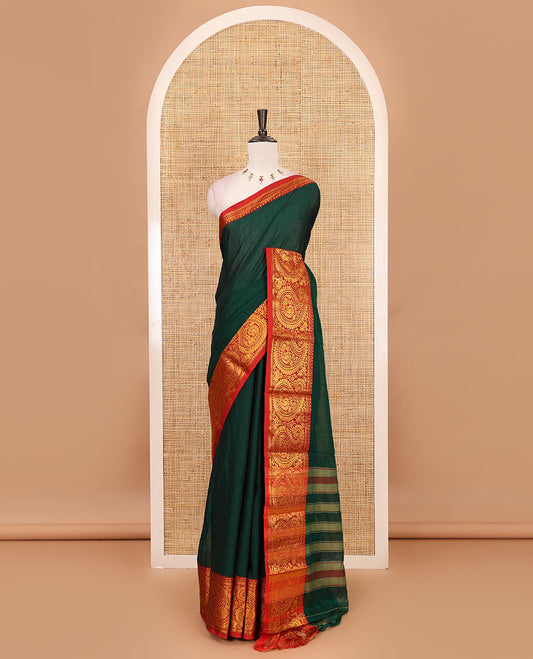 Green plain design mercerised cotton saree, contrast traditional peacock enclosed manga border, striped pallu & matching blouse