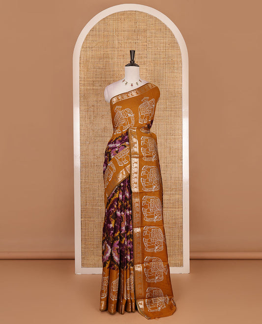 Purple-mustard shibori printed muslin cotton saree, contrast batik elephant print border of zari annam, batik elephant pallu, and contrast polka dots print blouse
