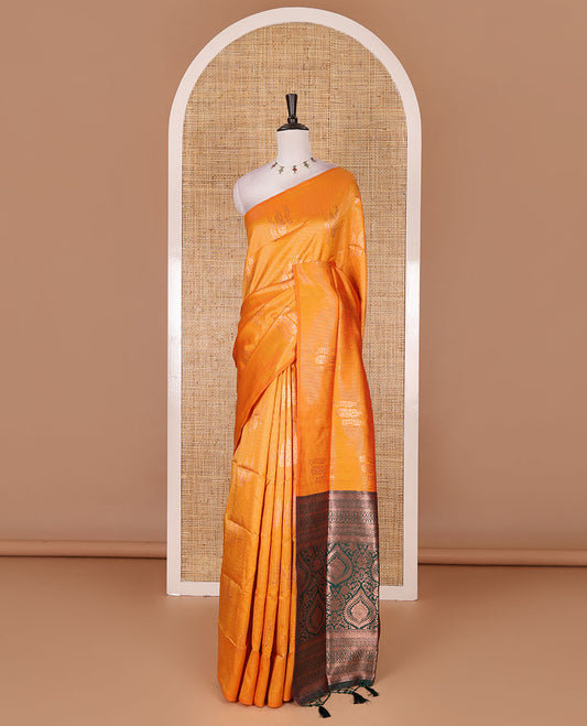 Borderless yellow stripes and zari floral buttas elite soft silk saree, contrast ogee patterned zari pallu, and contrast zari design blouse