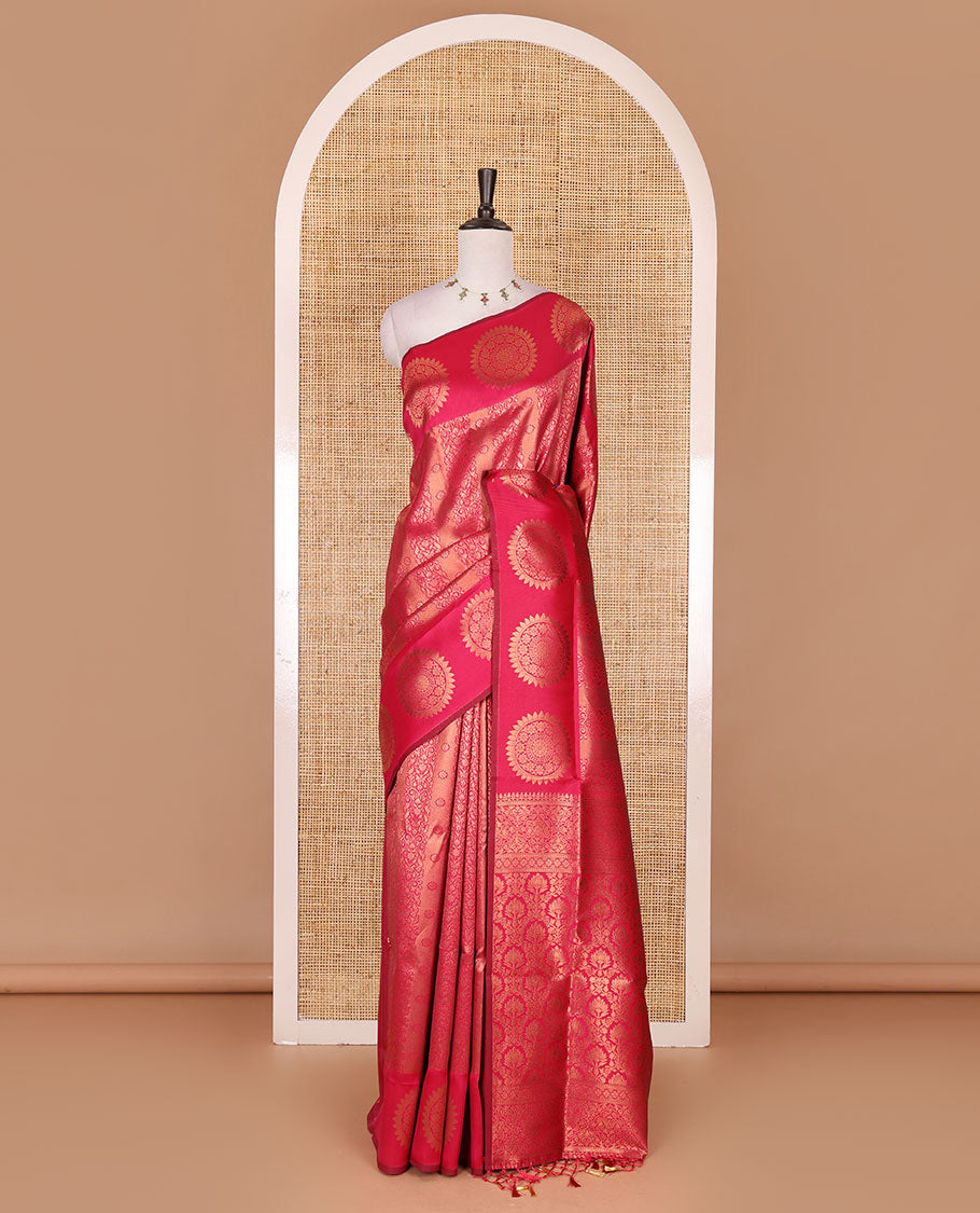Pink jacquard kanchi tissue saree, zari chakram motifs border, intricately zari woven pallu, and a matching zari design blouse