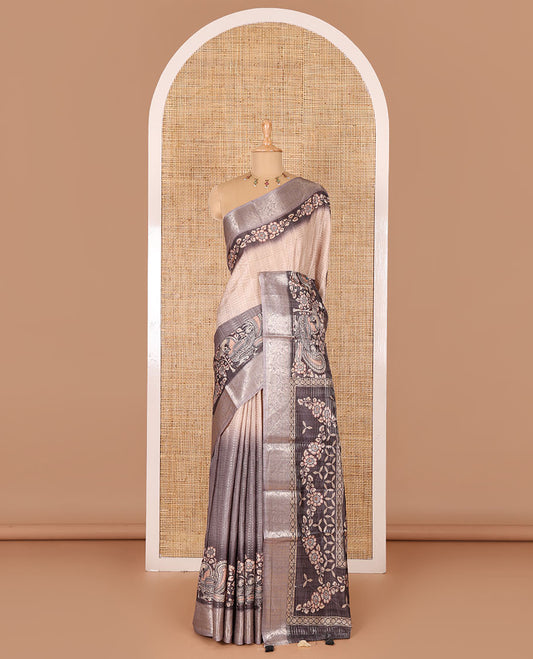 Grey tri-ombre colored zari stripes, and kalamkari peacock printed semi-tussar saree, contrast floral creeper zari border, peacock printed pallu, and a contrast blouse of zari and print work