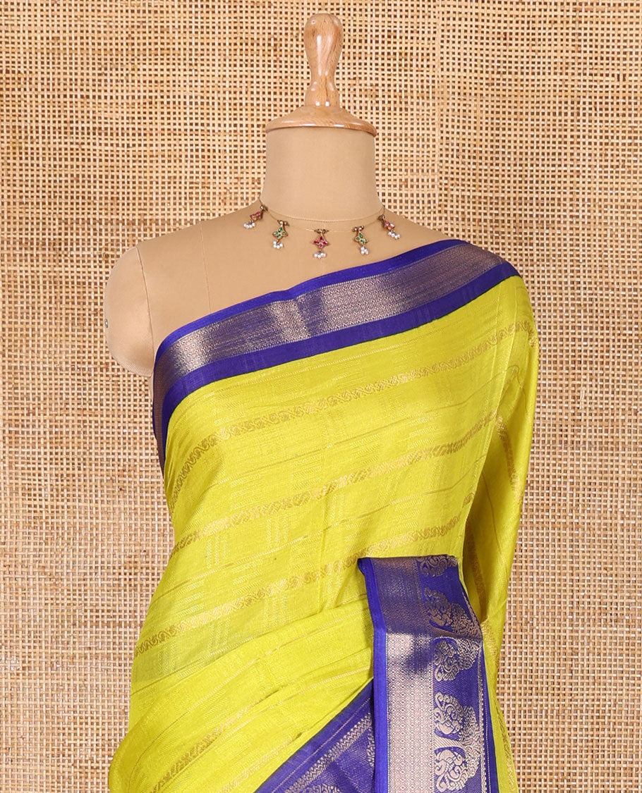 Yellow traditional zari design dola silk saree, contrast tree of life and peacock design border, zari design pallu, and contrast zari woven blouse