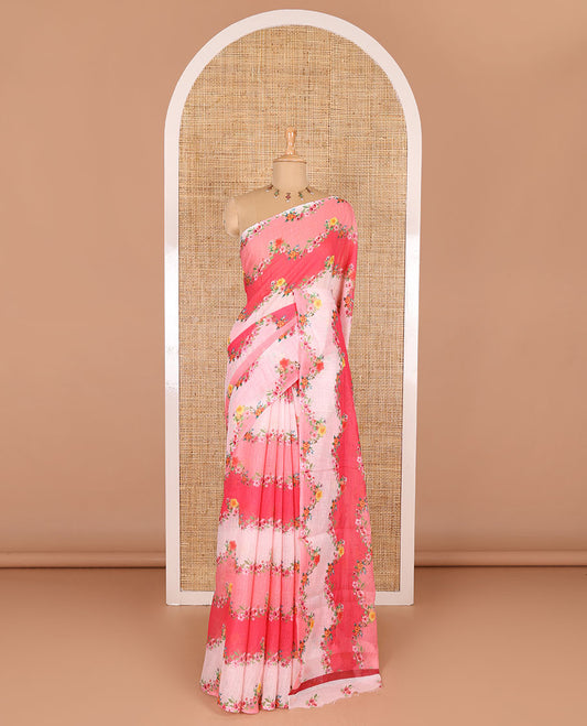 Borderless pink rangkat style dyed and floral printed linen cotton saree with a contrast printed blouse