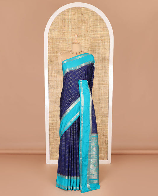 Blue maze geometric-patterned semi-mysore silk saree, contrast rettai pettu traditional zari border, intricate pallu, and a contrast geometric-patterned zari-bordered blouse