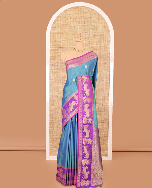 Blue zari buttas elite soft silk saree, contrast traditional zari border of Pichwai cow design, scallop pallu, and a contrast zari design blouse