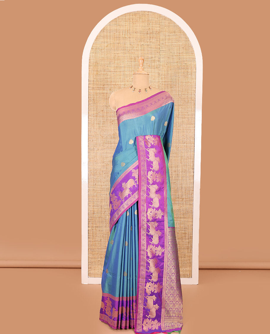 Blue zari buttas elite soft silk saree, contrast traditional zari border of Pichwai cow design, scallop pallu, and a contrast zari design blouse