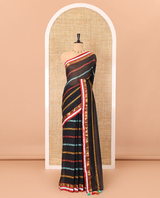Black horizontal multi-colored striped Khadi mul cotton saree, contrast satin gold zari piping border, striped pallu, and a matching blouse