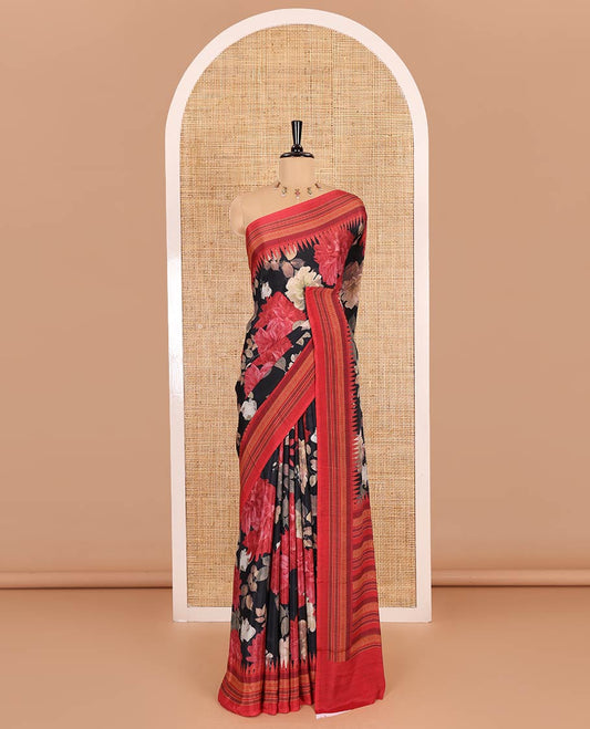 Black floral printed Italian crepe saree, contrast temple printed border, striped pallu, and a printed bordered blouse