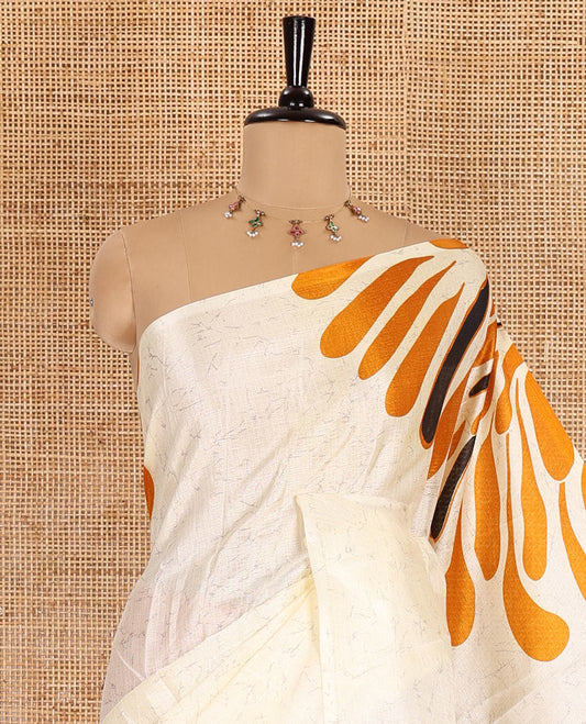 Borderless mustard fancy motifs batik-printed art khadi silk saree, contrast printed pallu, and a printed blouse