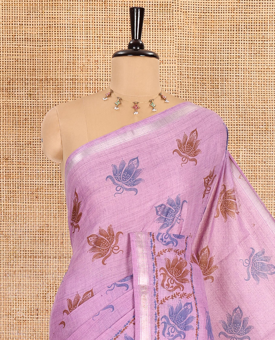 Pink lotus printed soft cotton saree, piping border, printed pallu, and a shibori printed blouse of polka dots