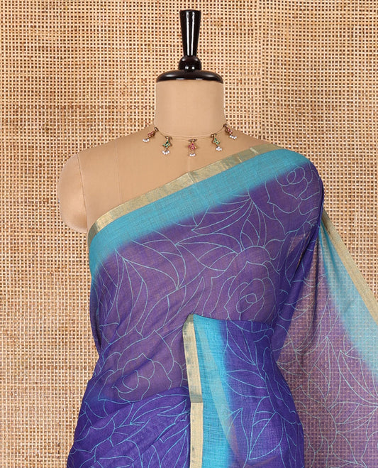 Violet rose floral printed linen cotton saree, contrast piping border, rose floral printed pallu, and a contrast leaf motifs printed blouse
