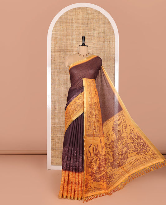 Coffee brown plain with swan motifs printed linen cotton saree, contrast floral creeper printed border, swan motifs printed pallu, and plain blouse