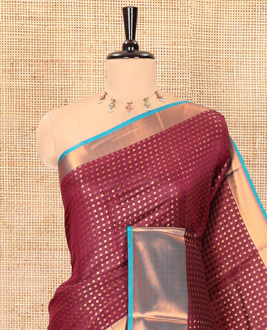 Purple zari buttas semi-soft silk saree, contrast plain zari border, contrast zari buttas steeped pallu, and a contrast zari design blouse