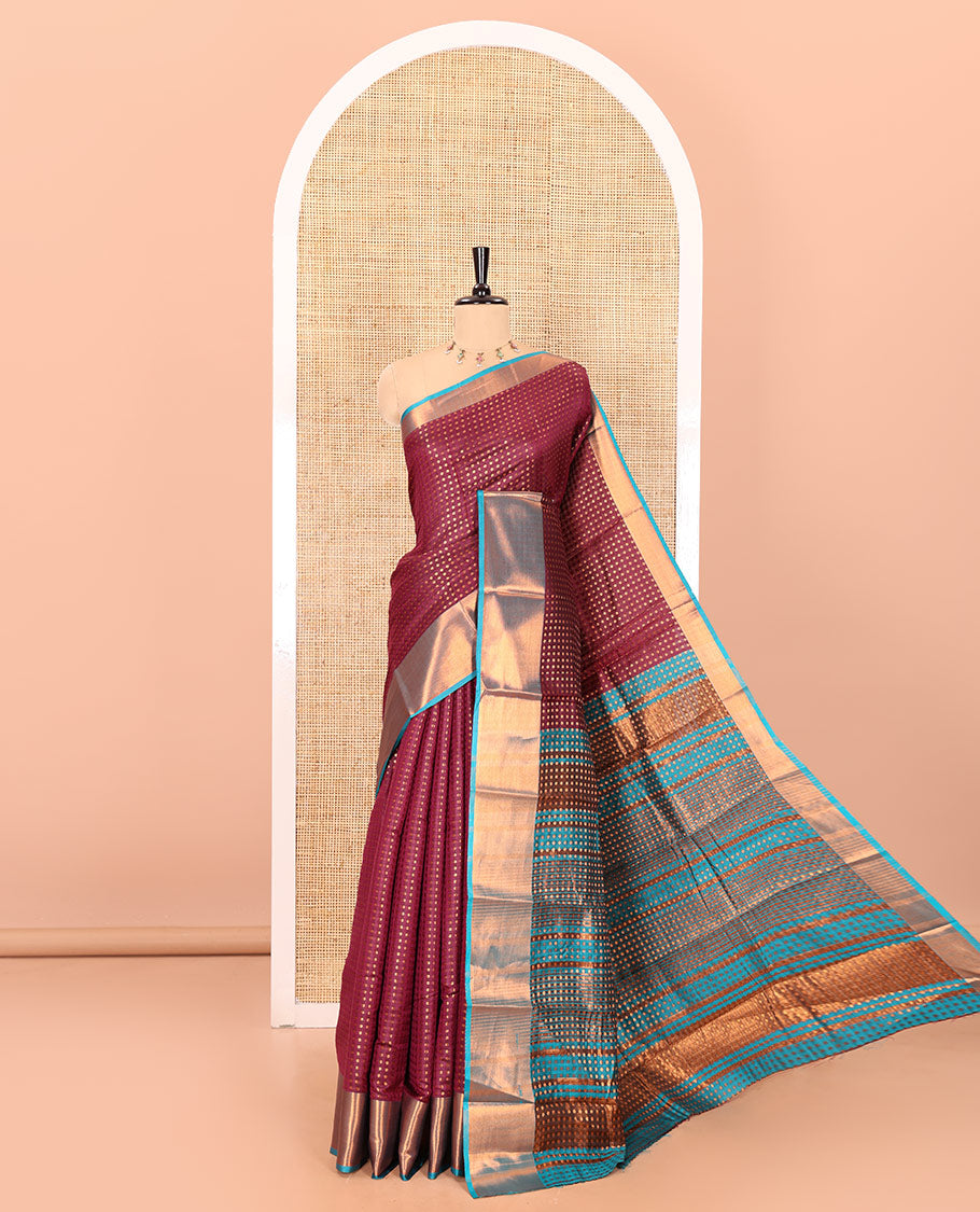 Purple zari buttas semi-soft silk saree, contrast plain zari border, contrast zari buttas steeped pallu, and a contrast zari design blouse