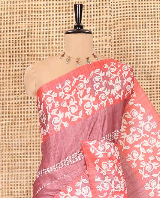 Pink sparkling dots and batik printed semi-tussar saree, contrast batik printed floral vine border, printed pallu, and a contrast printed blouse