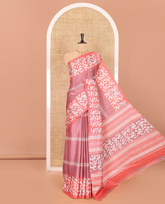 Pink sparkling dots and batik printed semi-tussar saree, contrast batik printed floral vine border, printed pallu, and a contrast printed blouse