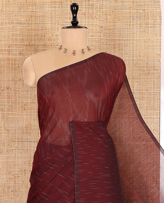 Borderless Maroon  Khadi Mul Cotton Saree Decked with Jharna-Style Waterdrop Motifs, Featuring a Gleaming Zari-Woven Pallu, Paired with a Matching Blouse Replicating the Body Motifs