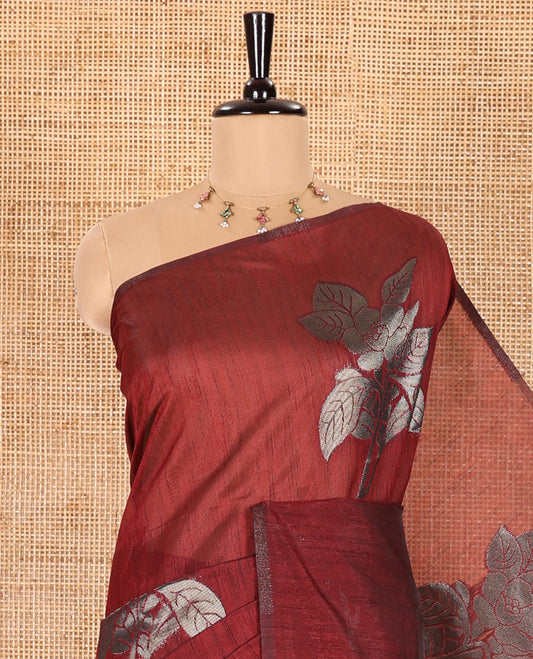 Borderless Maroon Kicha Tussar Saree Artfully Woven with Big Zari Floral Motifs All Over Its Body, Complemented by Intricately Zari-Woven Pallu, and a Contrast Blouse