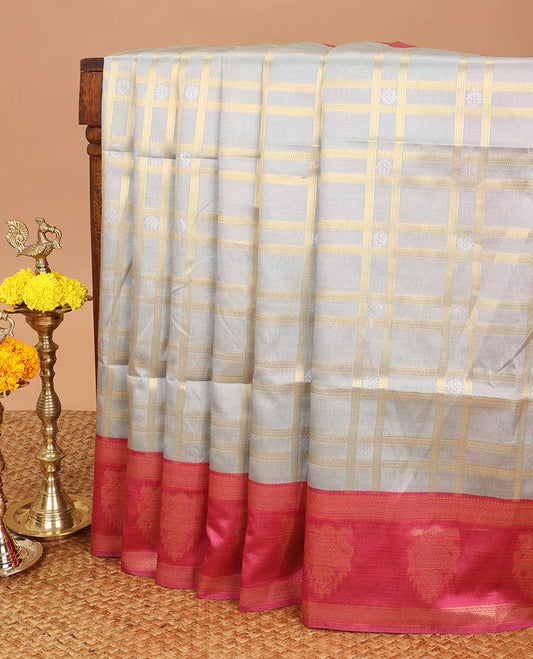 Grey check pattern soft silk saree with peacock design border & peacock design pallu along with peacock zari border blouse