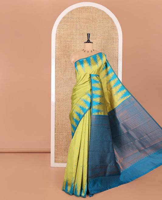 Apple Green Kanchi Silk Saree Detailed with Thread Buttas All Over Its Body, Complemented by a Contrast Temple Border, Grandly Woven Pallu of Intricate Design Weave, and Paired with a Contrast Blouse