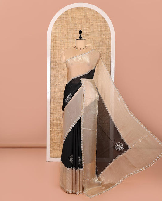 Black and Chikku Fendy Satin Saree Decorated with Rangoli-Style Swarovski Stone Work All Over Its Body, Complemented by Contrast Big Swarovski Stone Work Scallop Border, and Paired with a Contrast Stone Work Blouse