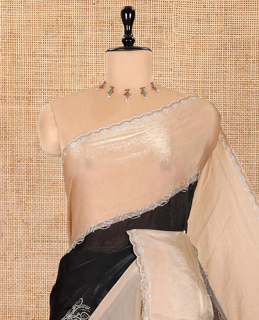 Black and Chikku Fendy Satin Saree Decorated with Rangoli-Style Swarovski Stone Work All Over Its Body, Complemented by Contrast Big Swarovski Stone Work Scallop Border, and Paired with a Contrast Stone Work Blouse