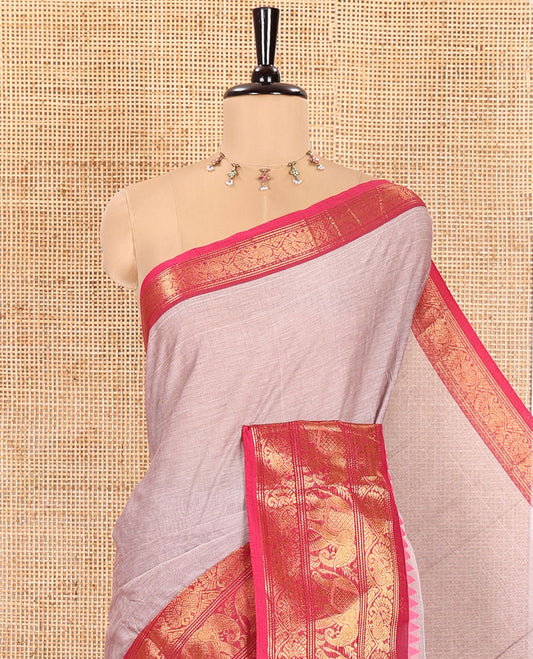 Grey Plain Chettinad Cotton Saree, Complemented by a Captivating Contrast Traditional Temple Border of Peacock-Elephant Designs, Subtly Striped Pallu, and Paired with a Matching Blouse