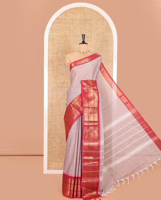Grey Plain Chettinad Cotton Saree, Complemented by a Captivating Contrast Traditional Temple Border of Peacock-Elephant Designs, Subtly Striped Pallu, and Paired with a Matching Blouse