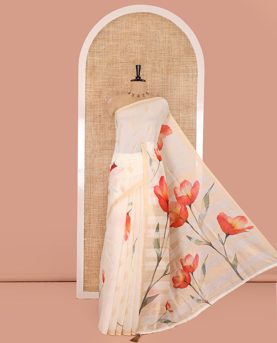 Cream Banaras Tissue Saree, Adorned with Floral Motifs Print and Zari Buttas on Its Body, Subtly Bordered, Pallu Pictures Floral Prints, and Paired with a Matching Printed Blouse