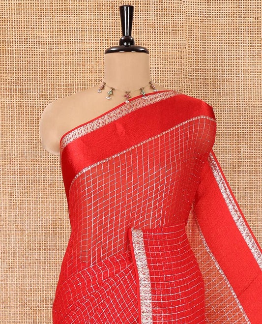Scintillating Red Viscose Georgette Saree Gleamed Up with Checked Design on Its Body, Highlighted by a Double-Pet Border, Zari Checked Design Pallu, and Paired with a Matching Blouse