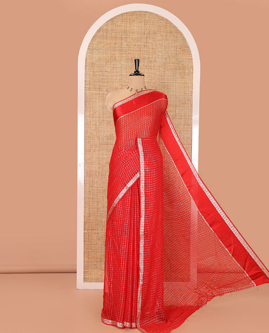 Scintillating Red Viscose Georgette Saree Gleamed Up with Checked Design on Its Body, Highlighted by a Double-Pet Border, Zari Checked Design Pallu, and Paired with a Matching Blouse