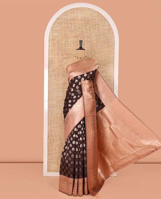 Brown and Peach Kanchi Silk Saree, Spotlighted with Zari Buttas All Over Its Body, Complemented by a Contrast Traditional Zari Border of Peacock Designs, an Intricately Designed Pallu, and Paired with a Contrast Blouse