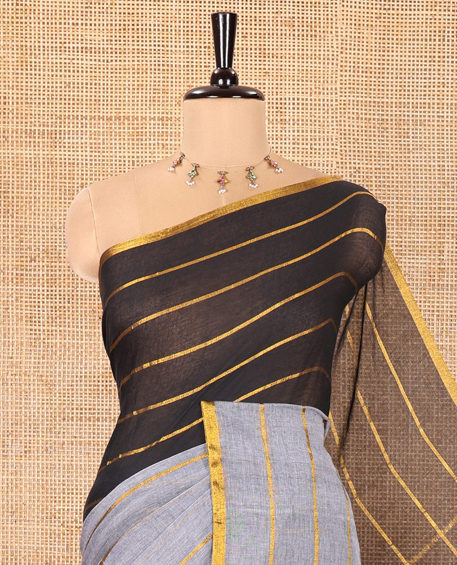 Grey and Black Khadi Mul Cotton Saree, Elevated with Horizontal Zari Stripes on Its Body, Zari Piping Border, Subtly Striped Pallu, and Paired with a Contrast Blouse