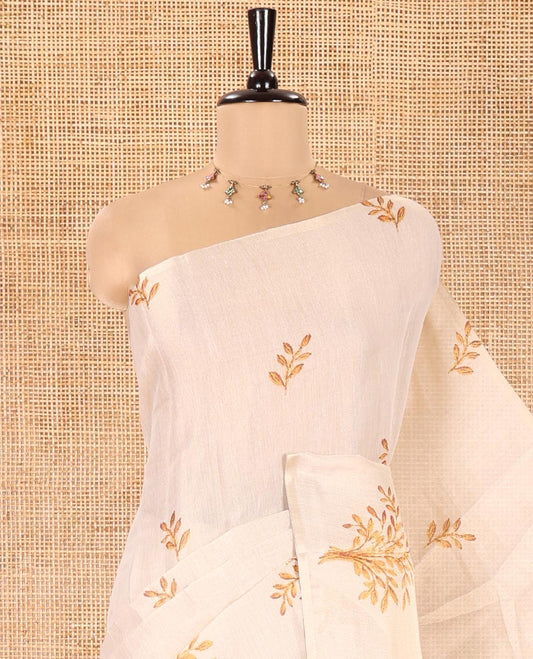 Cream Tissue Saree, Entralled with Leaf Motifs Printed On Its Body, Self-Border, Floral Printed Pallu, and Paired with a Printed Blouse