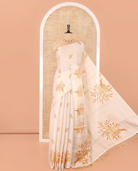 Cream Tissue Saree, Entralled with Leaf Motifs Printed On Its Body, Self-Border, Floral Printed Pallu, and Paired with a Printed Blouse