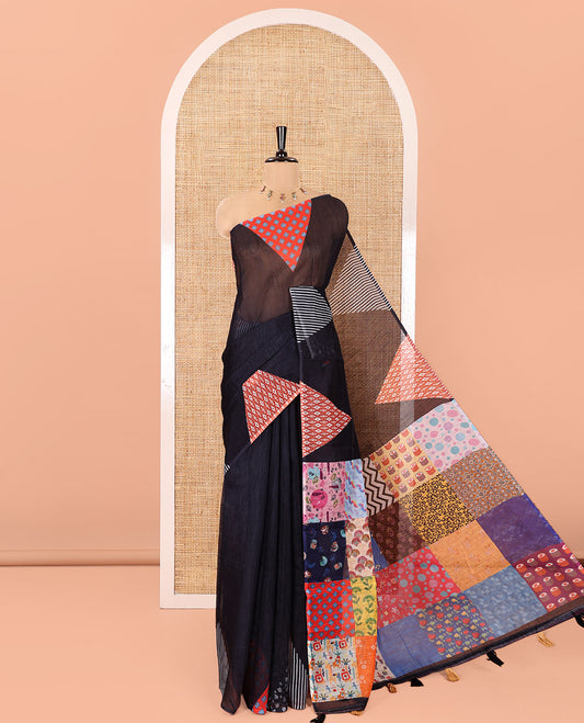 Black Plain Linen Cotton Saree, Complemented by a Contrast-Colored Triangle on Its Border, Kaleidoscopic-Color Patchwork Pallu, and Paired with a Contrast Blouse