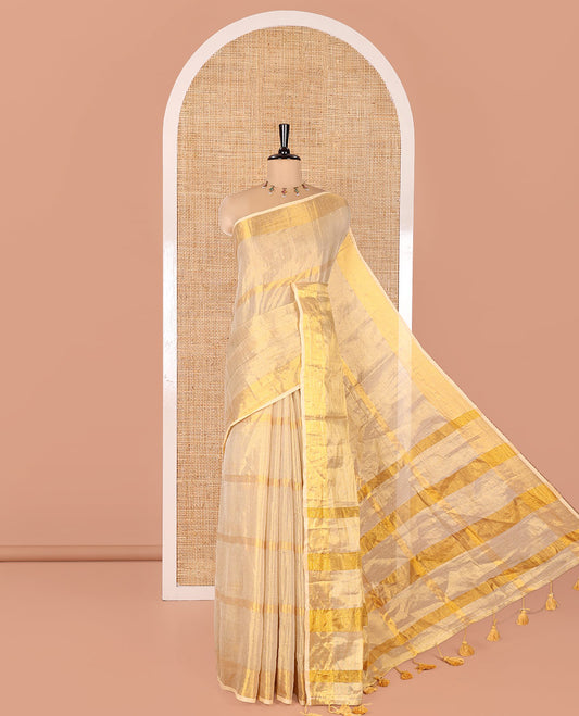Gleaming Gold Khadi Tissue Saree, Elevated with Zari Stripes All Over Its Body, Highlighted by Zari Bavanji Border, Zari Striped Pallu, and Paired with a Matching Blouse
