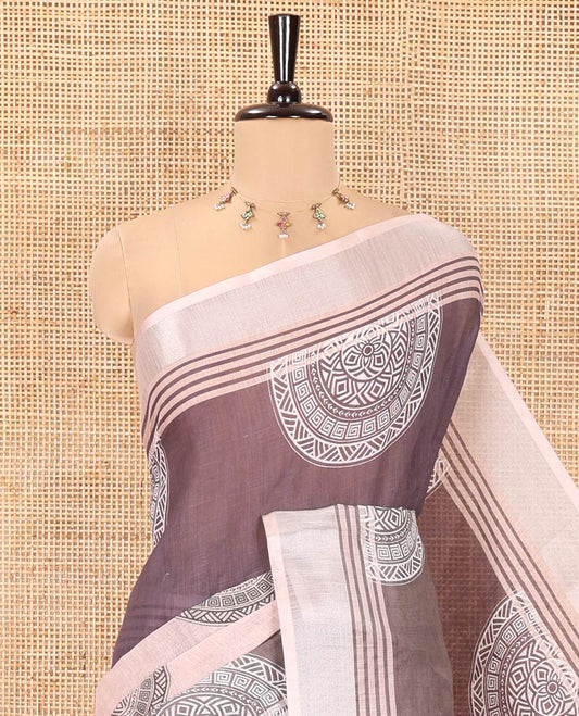Chikku and Green Linen Cotton Saree, Delicately Printed With Rangoli Circle Motifs Printed On Its Body, Complemented by Contrast Border, Abstract Printed Pallu, and Paired with a Contrast Printed Blouse