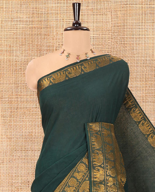 Green Plain Sungudi Cotton Saree, Highlighted by Traditional Zari Border of Peacock and Elephant Motifs Weave, Subtly Striped Pallu, and Paired with a Contrast Veldhari Design Blouse