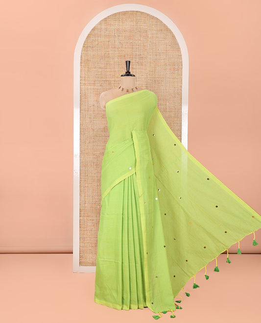 Borderless Parrot Green Mul Cotton Saree, Subtly Sparkled With Big Sequins Work On Its Body, a Self-Pallu and Paired with a Matching Blouse