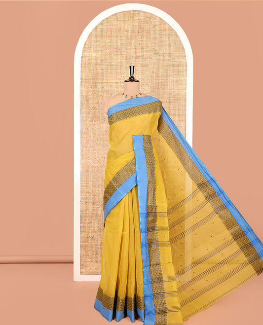 Yellow Bengal Cotton Saree, Subtly Woven with Thread Buttas All Over Its Body, Complemented by a Contrast Border of Temple and Jaal Designs, Pallu of Stripes and Buttas, and Comes Without a Blouse