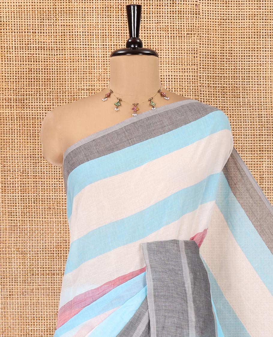 Off-White and Blue Chettinad Cotton Saree, Steeped with Stripes All Over Its Body, Complemented by a Contrast Plain Border, Pallu of Stripes, and Has No Blouse