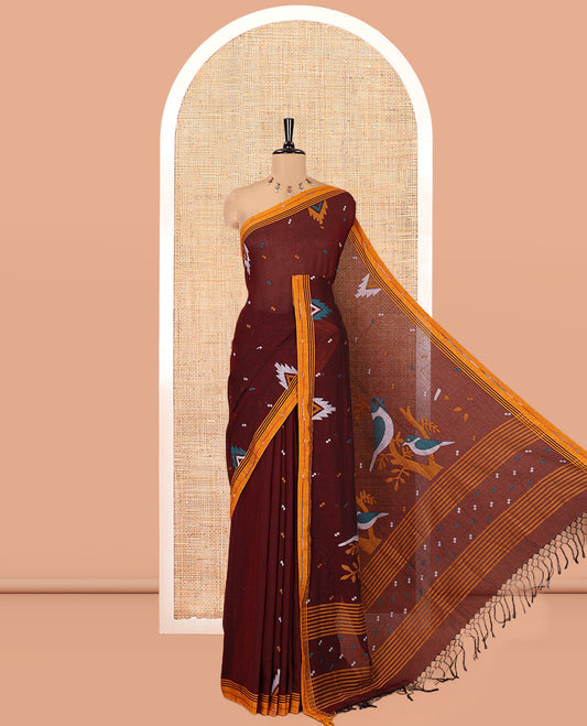 Maroon Khadi Mul Cotton Saree, Beautified with Meena Buttas All Over Its Body, Complemented by a Contrast Temple Border, Pallu of Jhamdani-Style Floral-Bird Weaving, and Paired with a Matching Blouse
