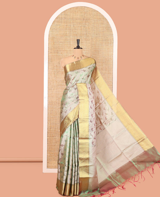 Green Tissue Saree, Gleamed Up with Leaf Jacquard Design, Zari Traditional Border, a Self-Pallu, and a Matching Blouse