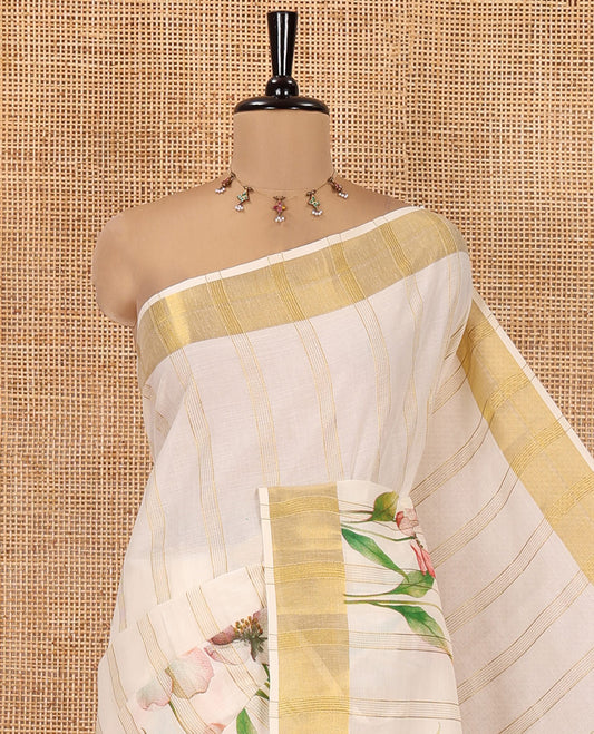 Cream Kerala Cotton Saree, Adorned with Zari Stripes and Floral Print, Highlighted by Zari Border, Printed Pallu and a Matching Blouse